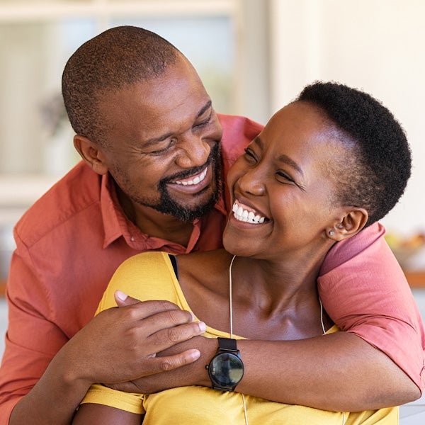 Husband hugging wifge