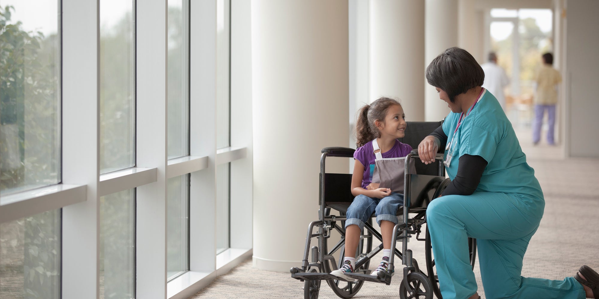 Health care worker with young patient
