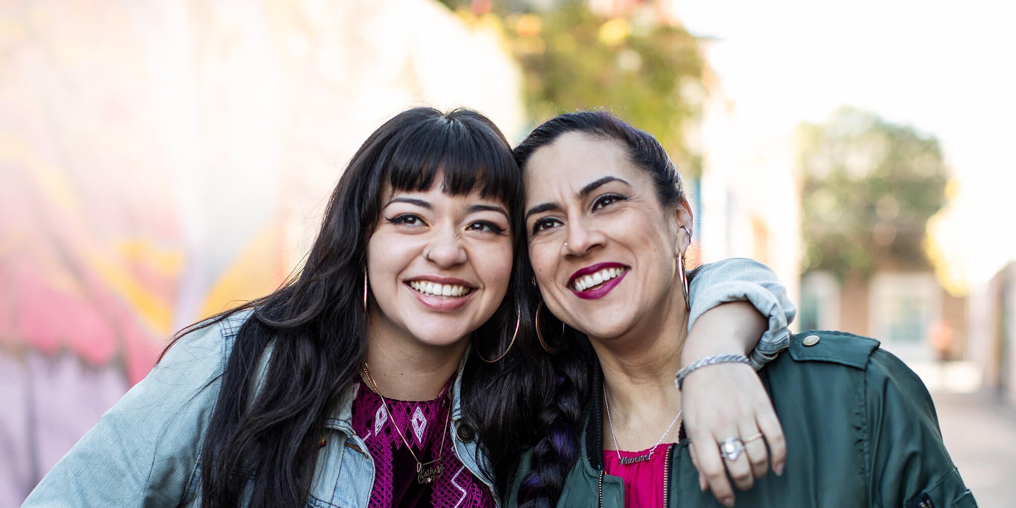 Two women smiling at the camera