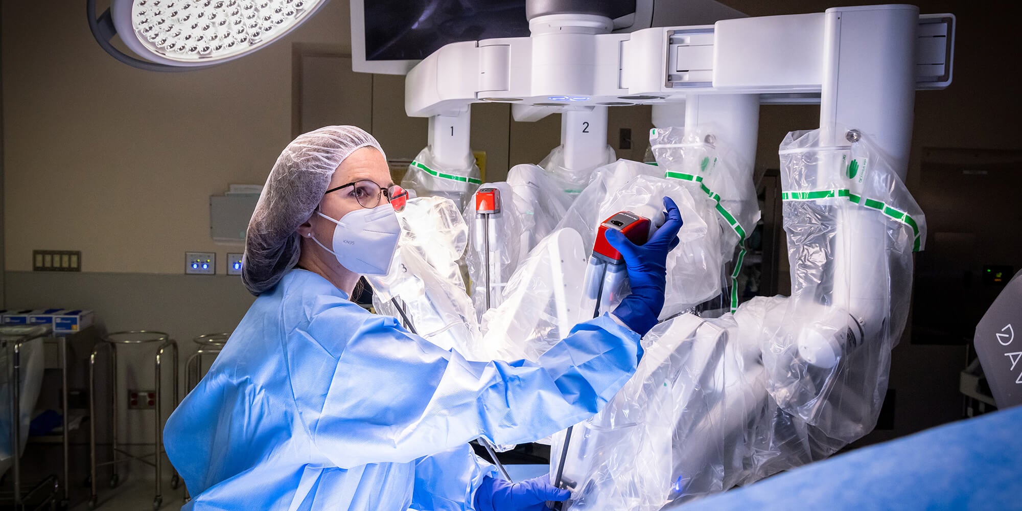 Loyola surgeon using surgical tool