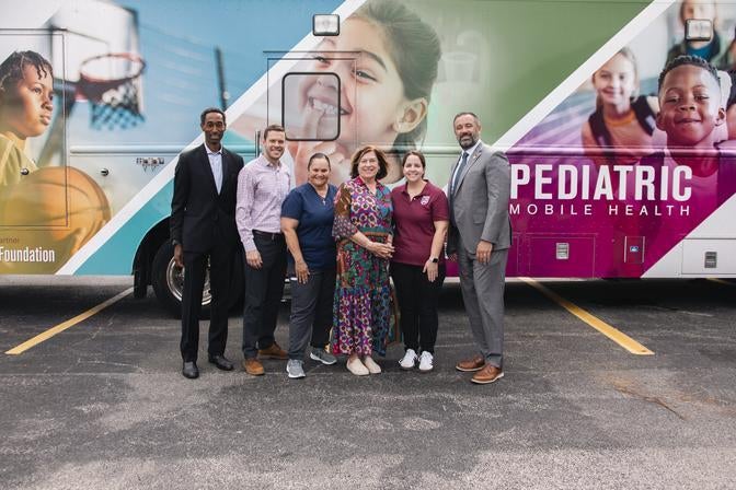 Pediatric mobile van photo with team