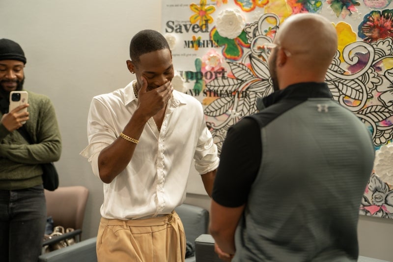 Damon and Syeed chatting