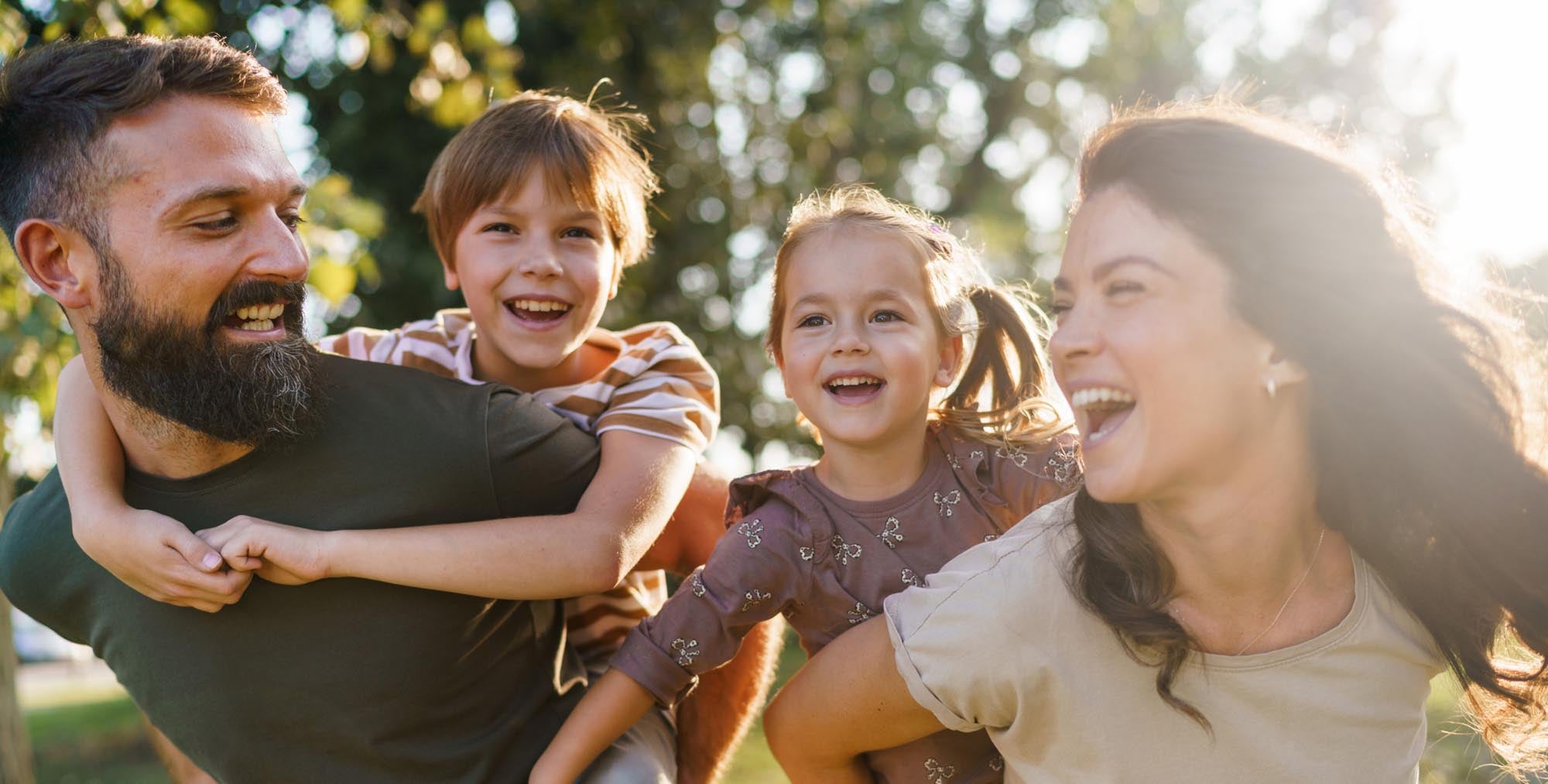 Parents and 2 children enjoying the outdoors