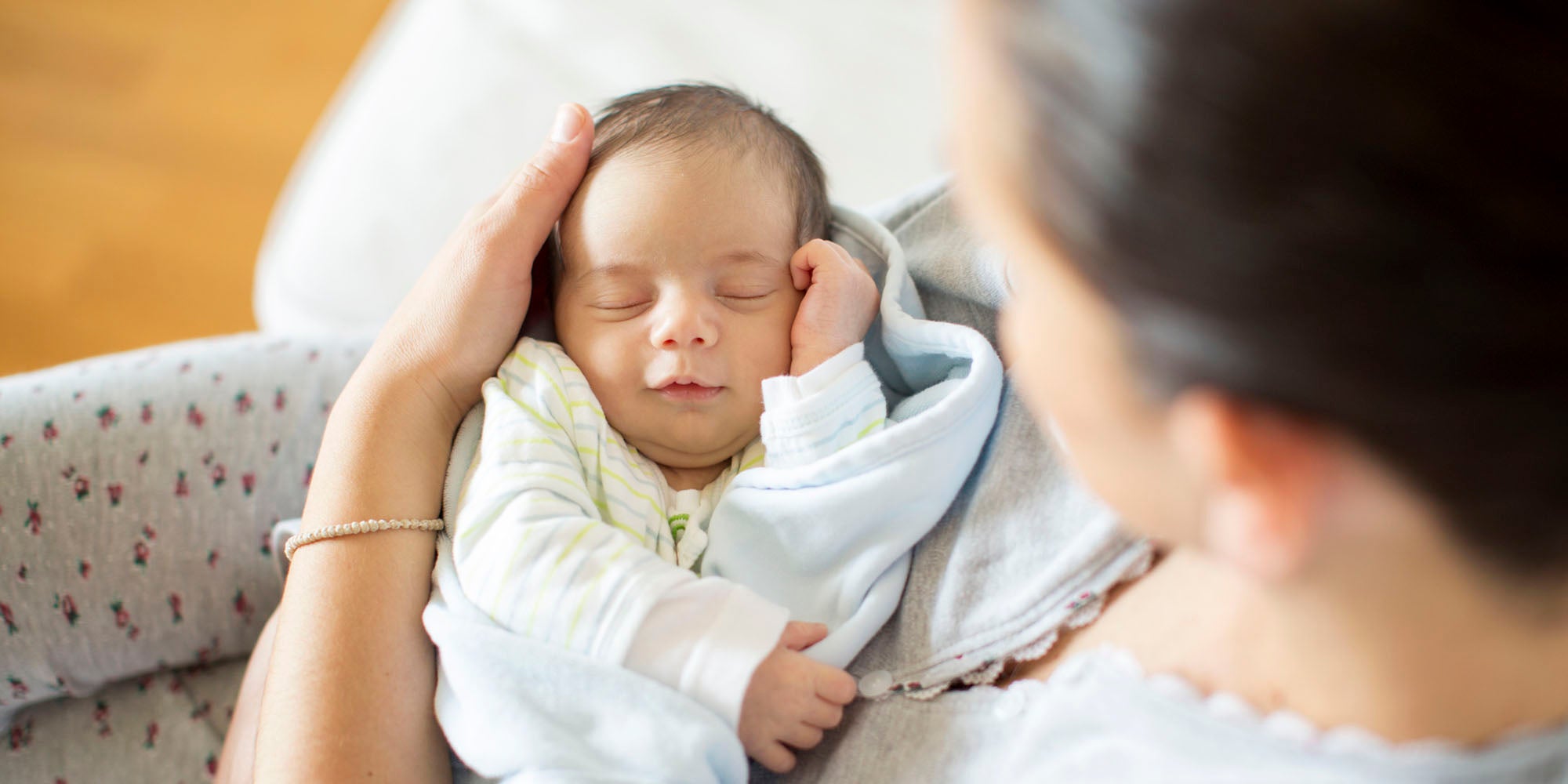 Mother holding newborn