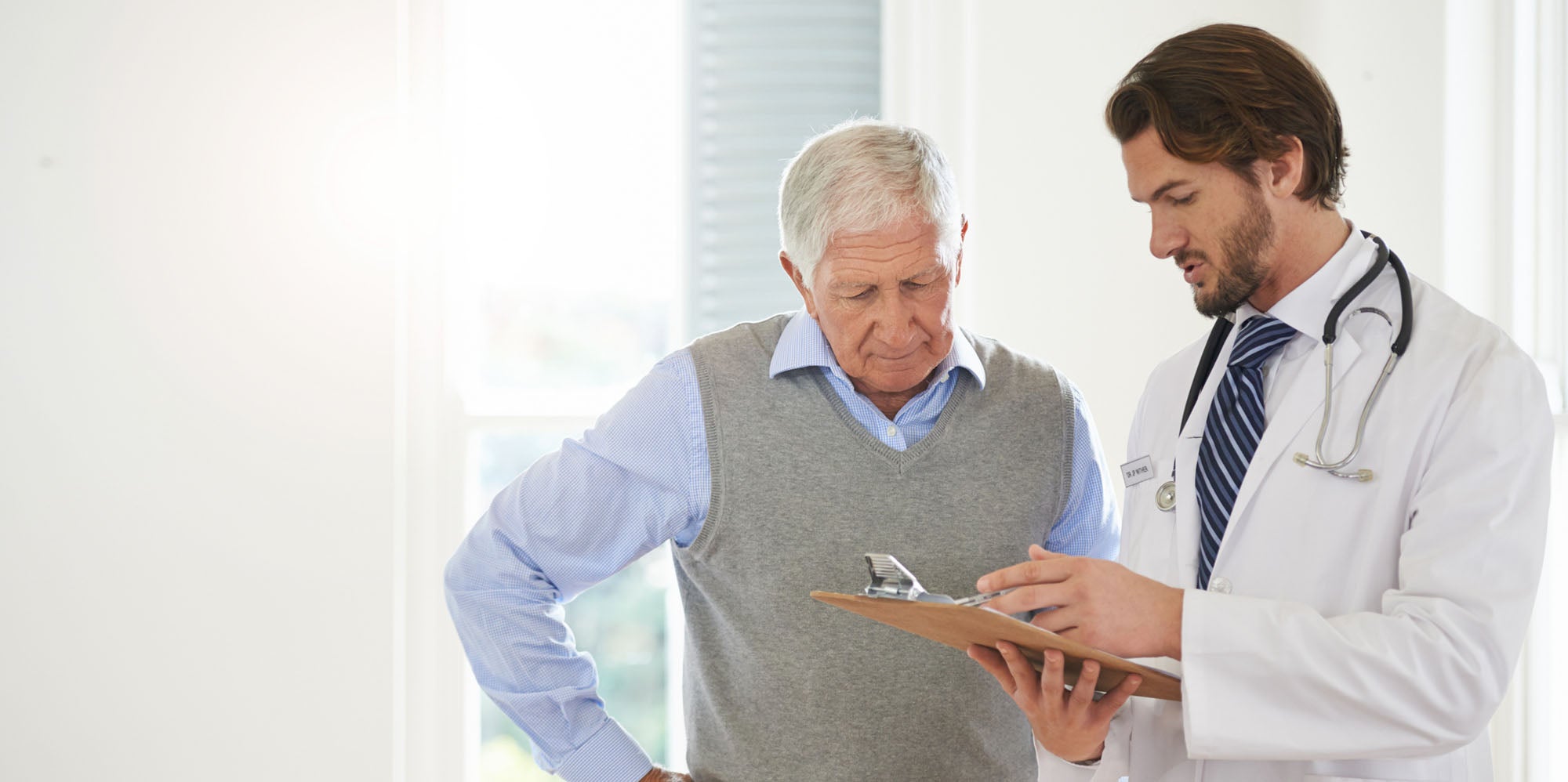 Doctor and patient reviewing a chart