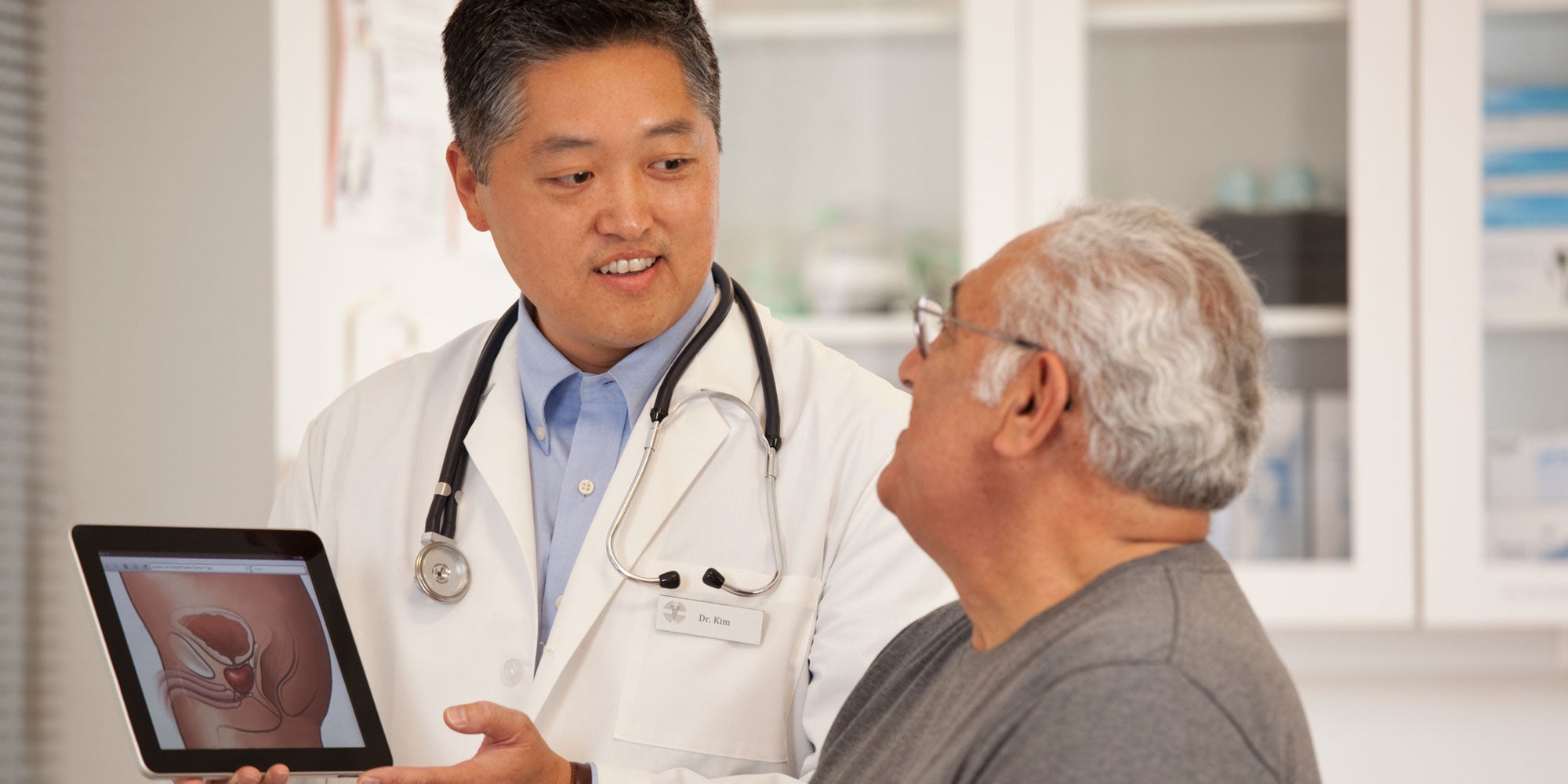 Doctor reviewing chart with patient