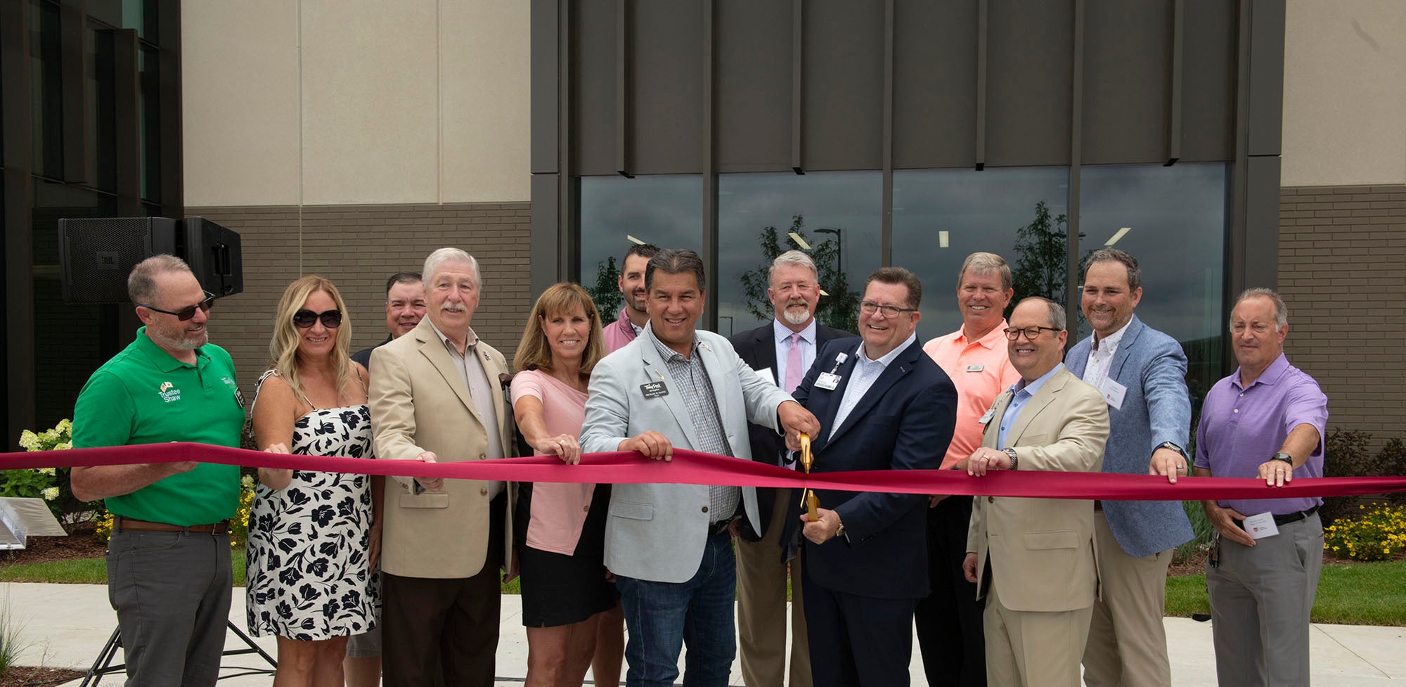 Loyola team cutting the ribbon