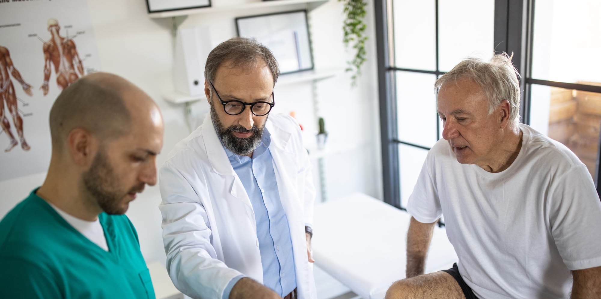Doctors talking to patient