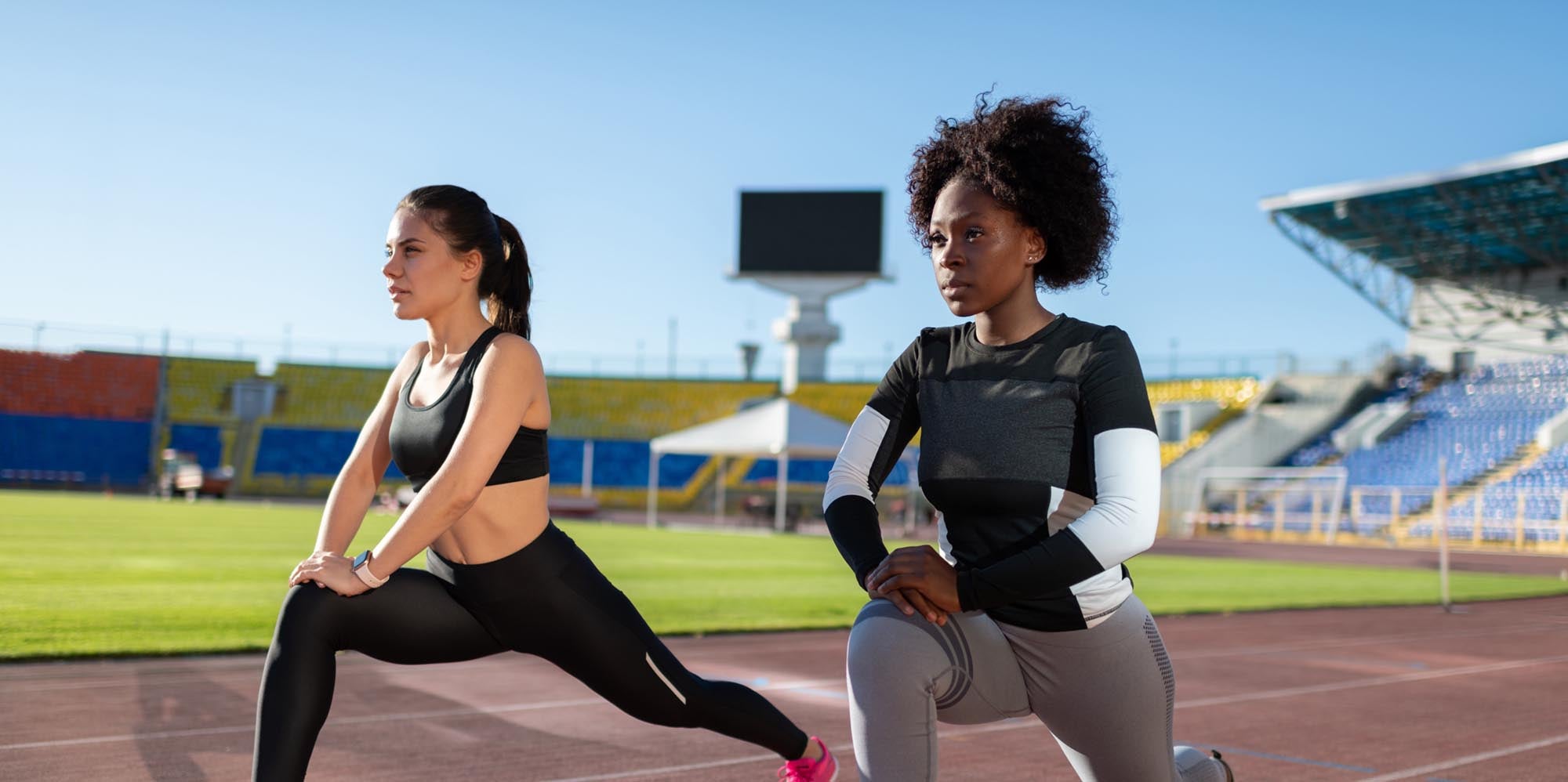 Female athletes stretching