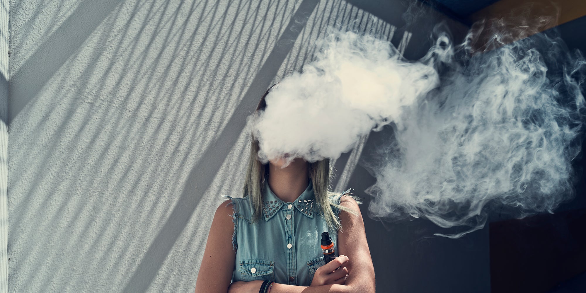 Female teen vaping
