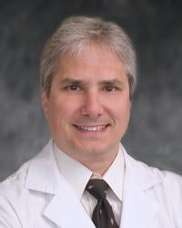 Ronald E Stella, MD
