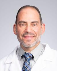 Malek Hussein Akhal, MD