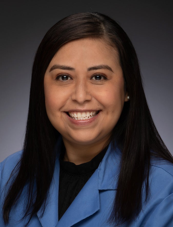 Laura Rios-Coste, AuD