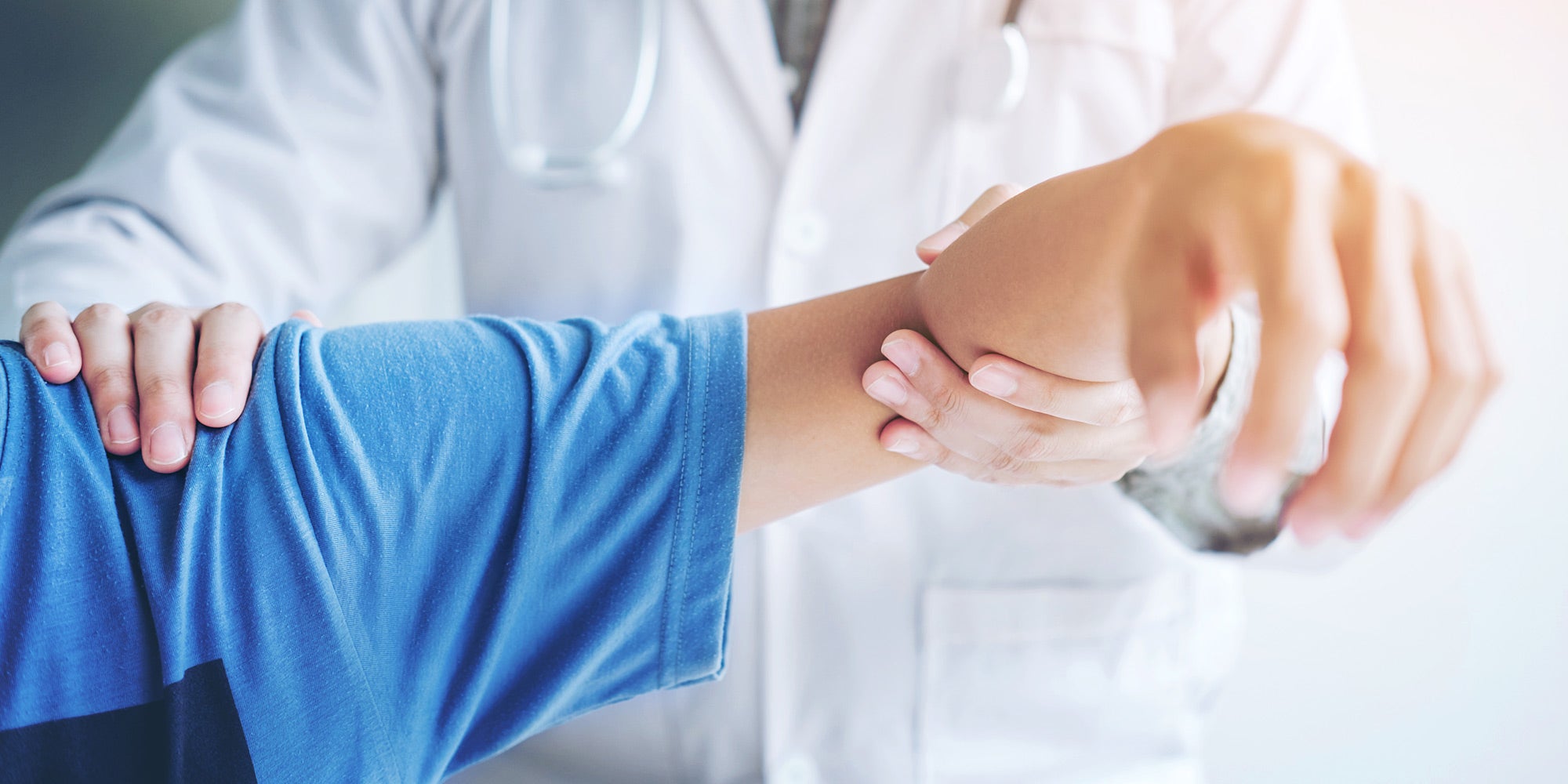 Rehabilitation doctor with patient