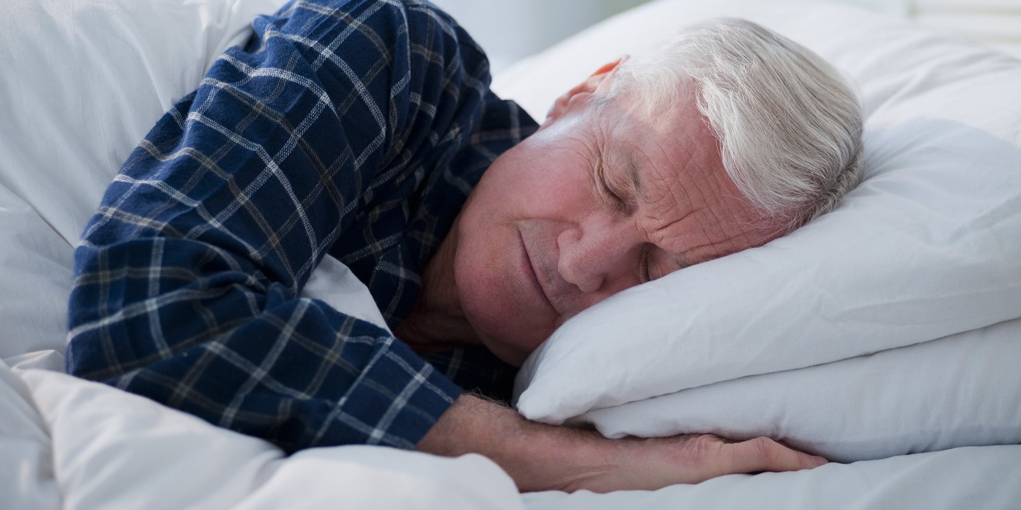 Man sleeping in bed apnea