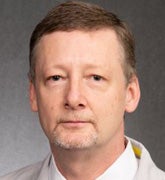 Giles Simpson, MD