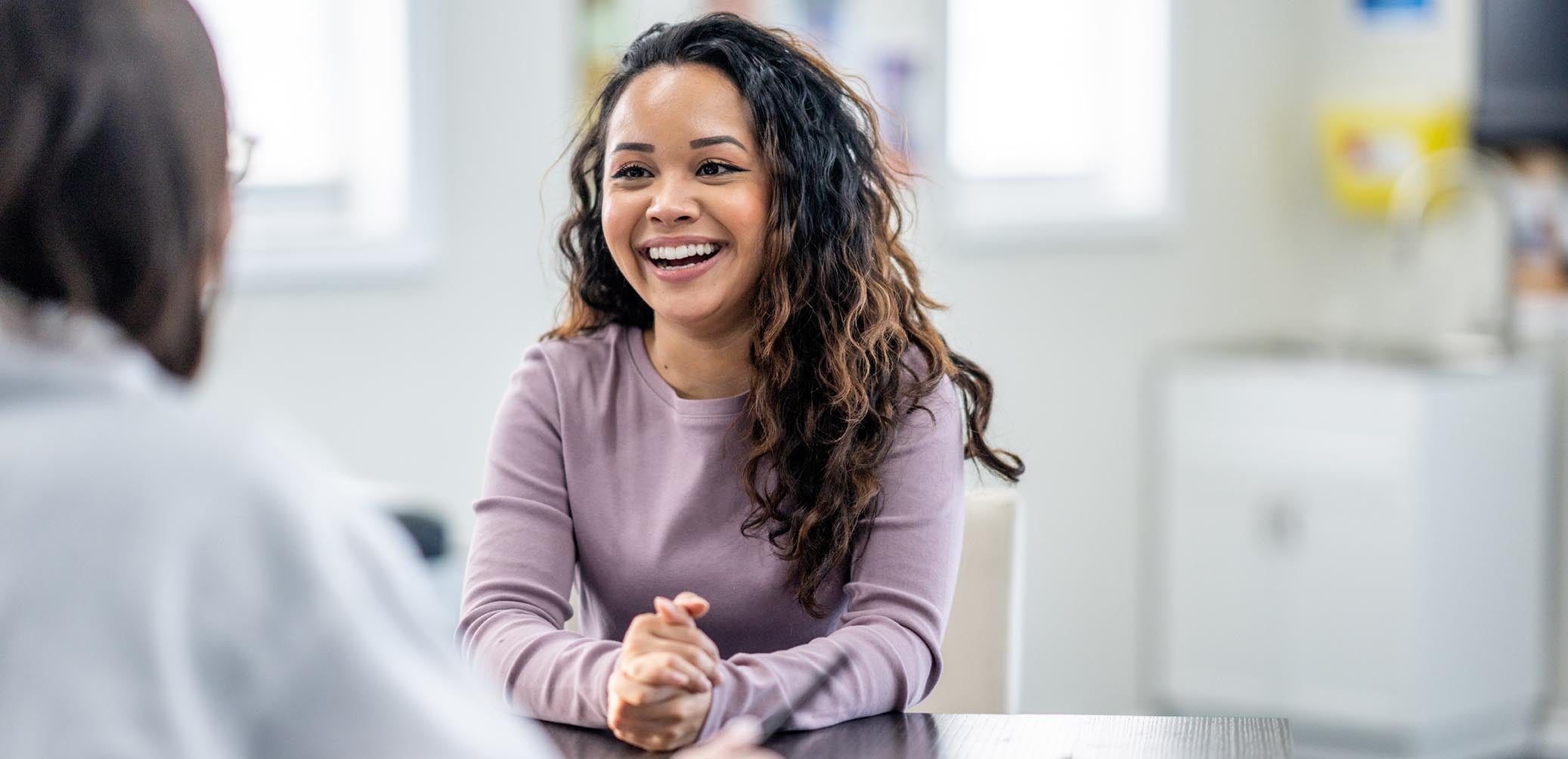 Patient talking to her provider