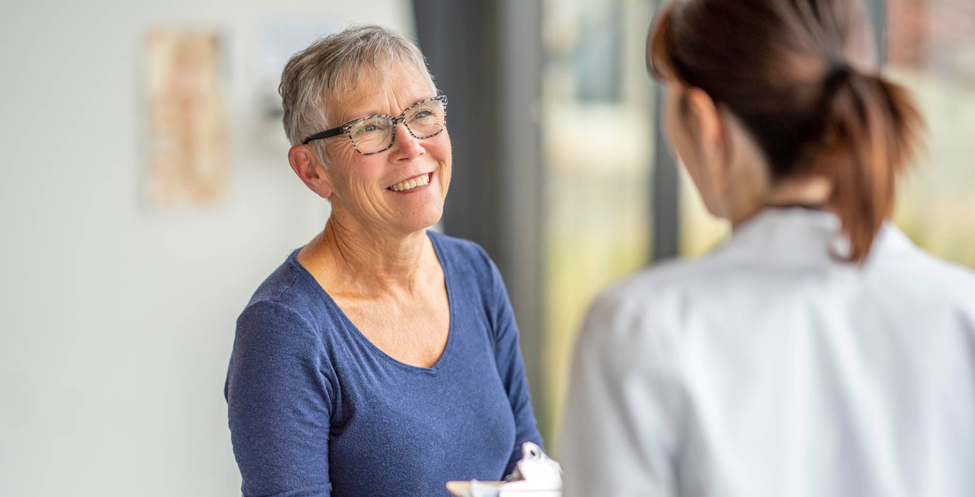 Doctor talking to her patient
