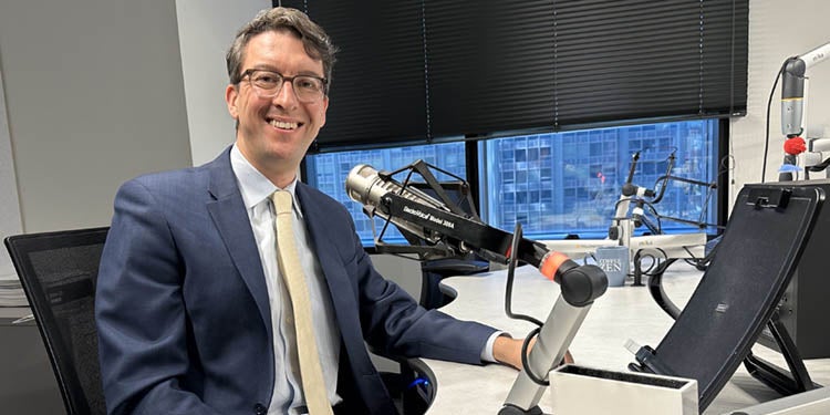 Dejan Micic, MD on a podcast