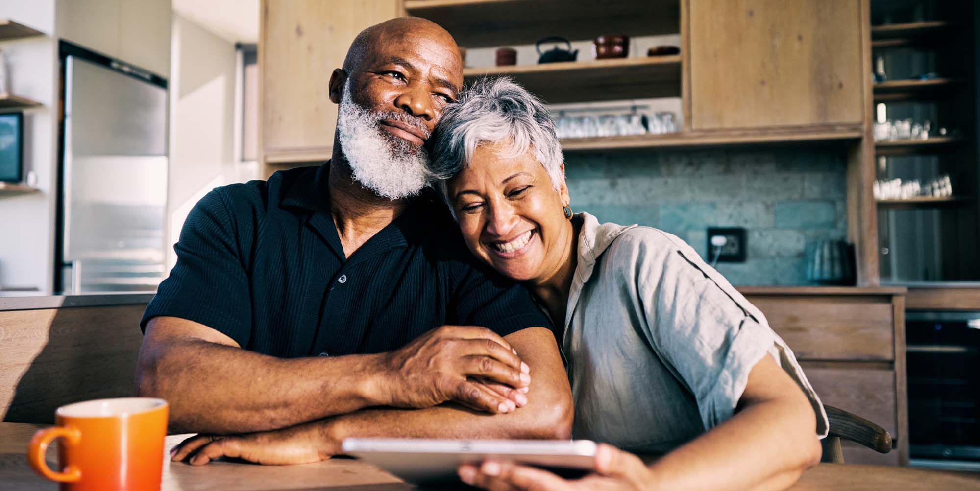 A couple embracing on a couch
