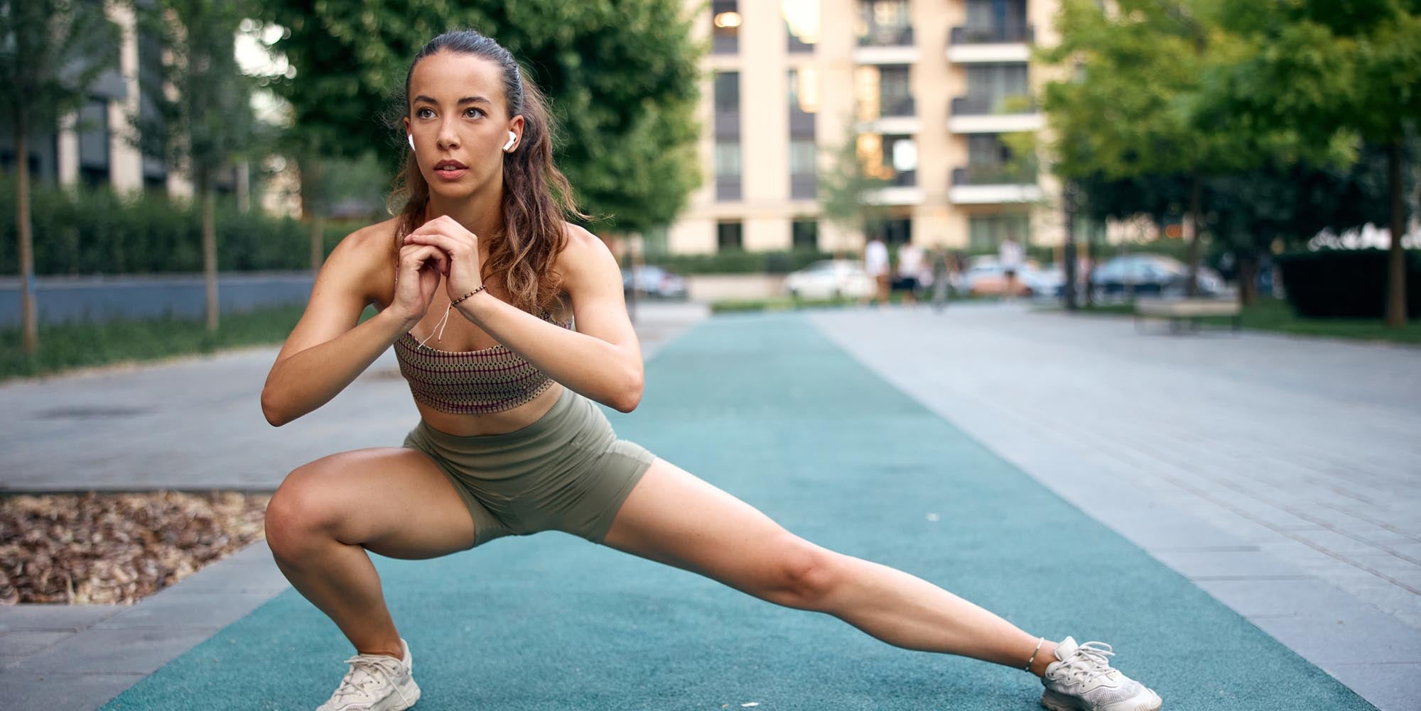 Woman athlete stretching